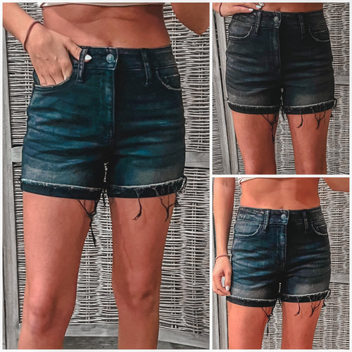 Washed blacked cuffed raw hem denim shorts